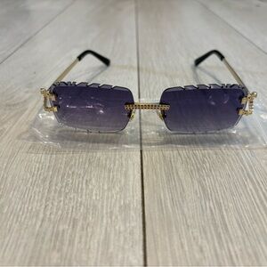 Elegant Purple Sunglasses with Gold Accents